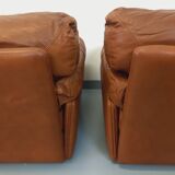 Pair of vintage Coquelicot lounge chairs by Tito Agnoli for Poltrona Frau in leather from the 70s