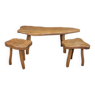 Set of coffee table and 2 brutalist designer stools in solid elm