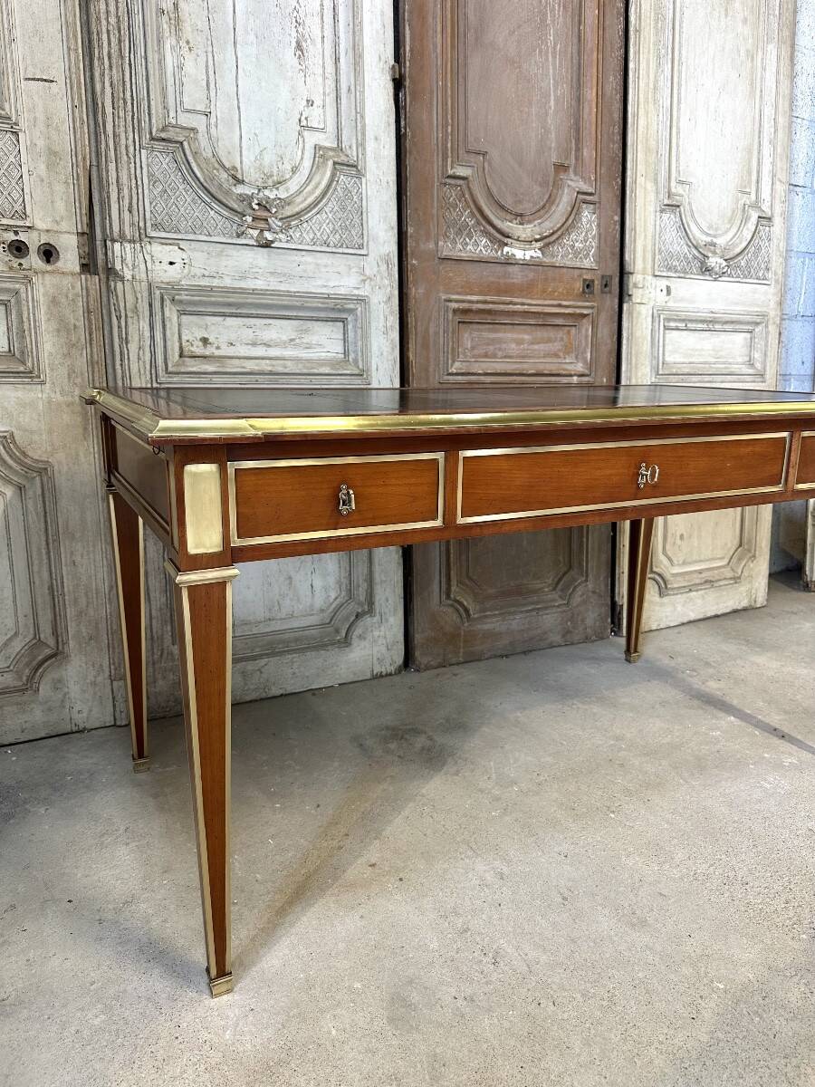Directoire style flat desk in cherry wood, 20th century.
