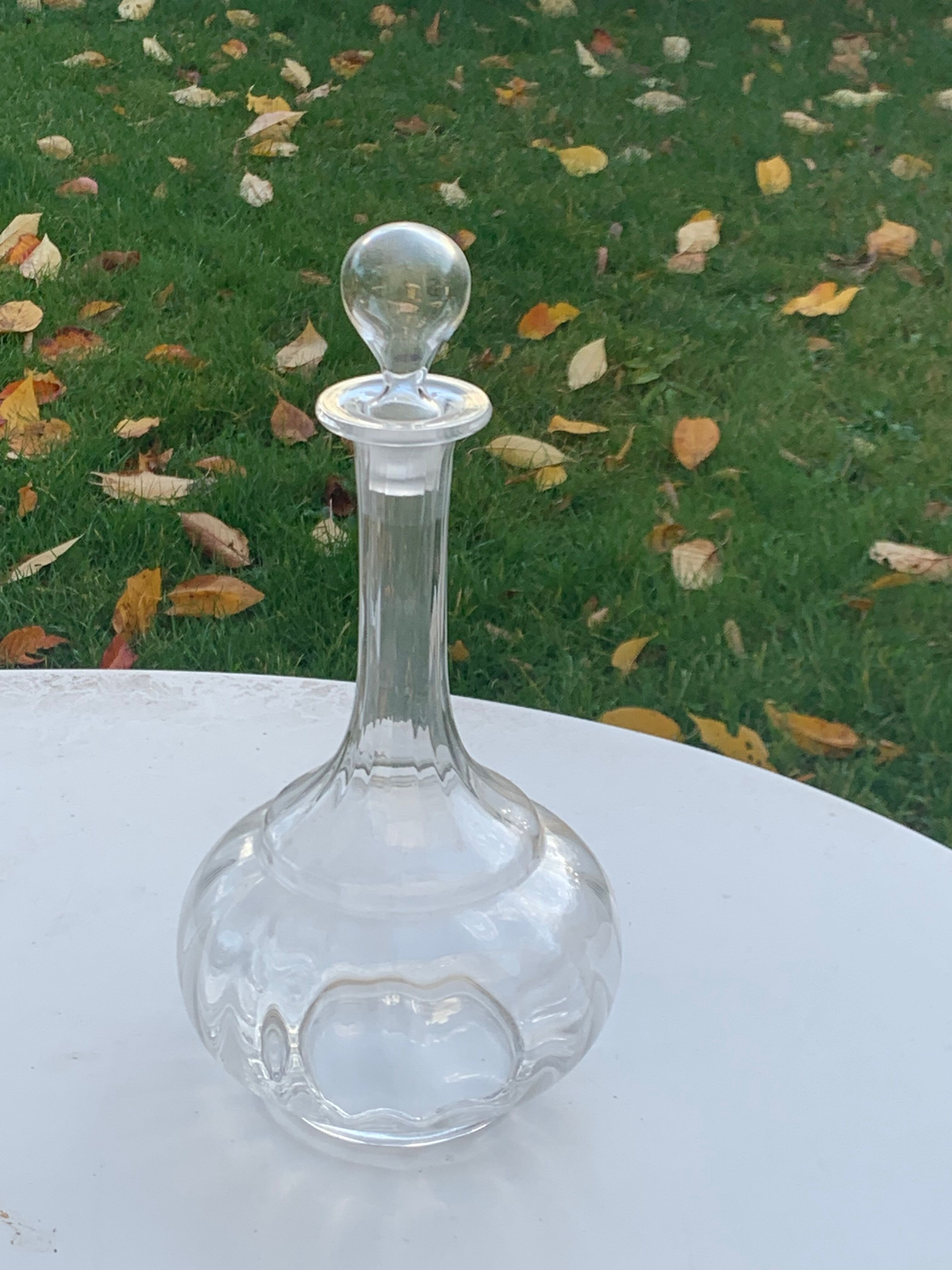 Elegant and vintage transparent glass wine decanter