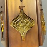 Older hanging lamp, made of metal with yellow prisms.