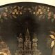 Large tilting pedestal table, black lacquered wood with a lively oriental landscape decoration.