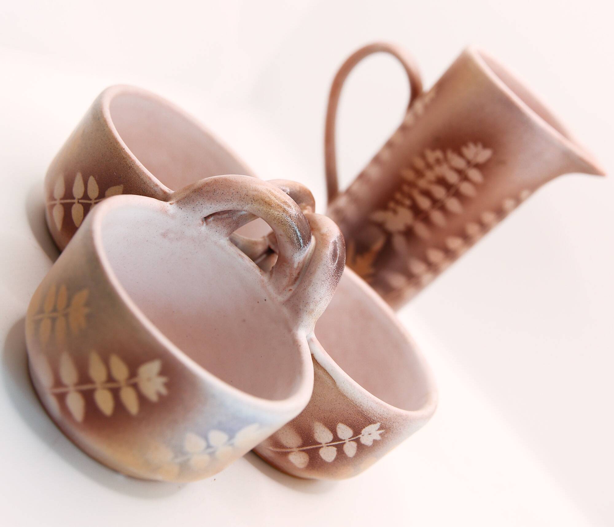 Lot of a pitcher and bowl with old pink flowers by Jean Austruy