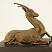 Horloge art déco marbre onyx & brass avec une gazelle spelter bronzée