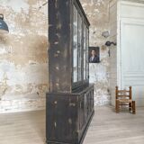 Display cabinet in patinated wood