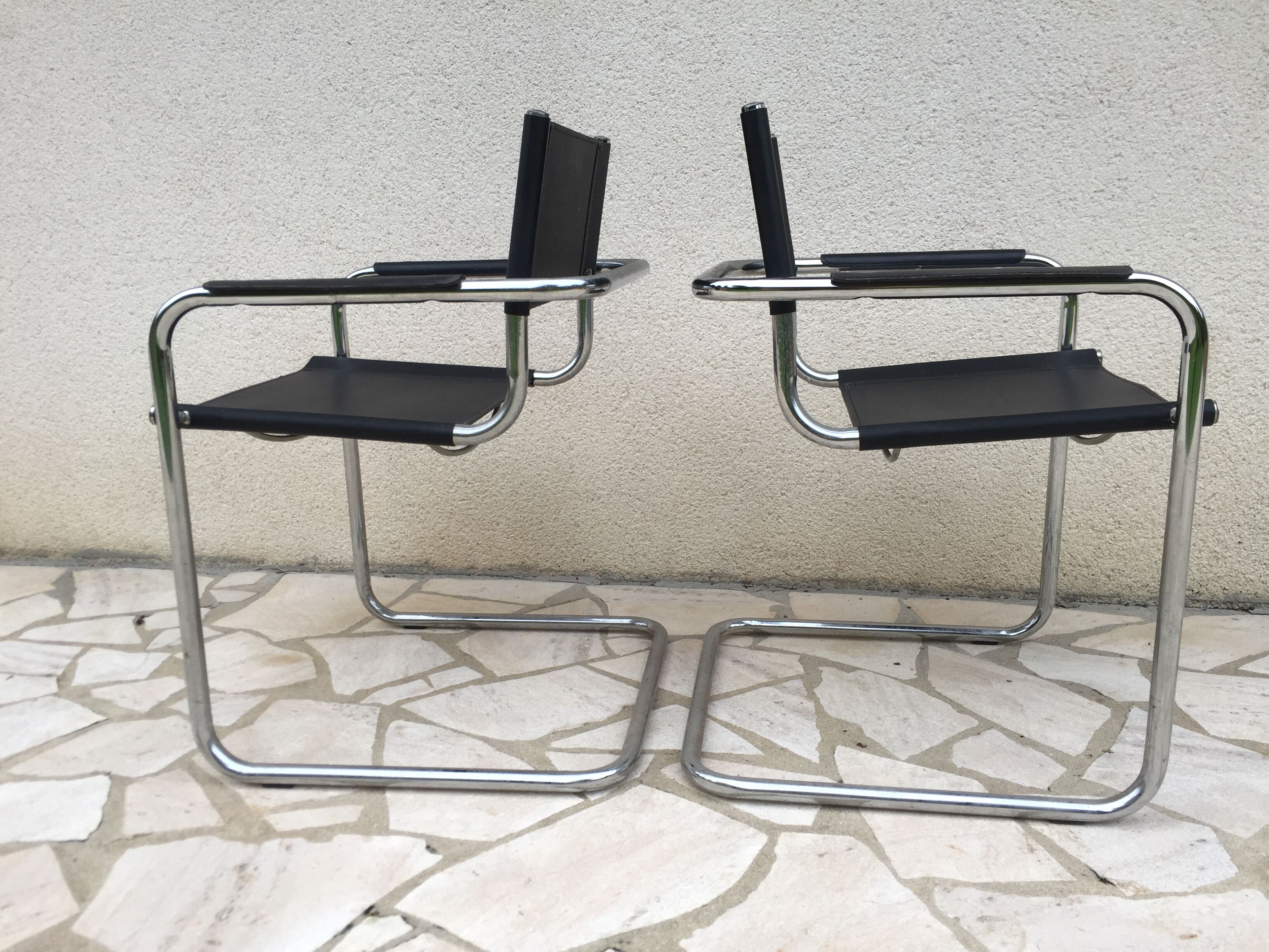 Pair of faux leather and chrome chairs 70s