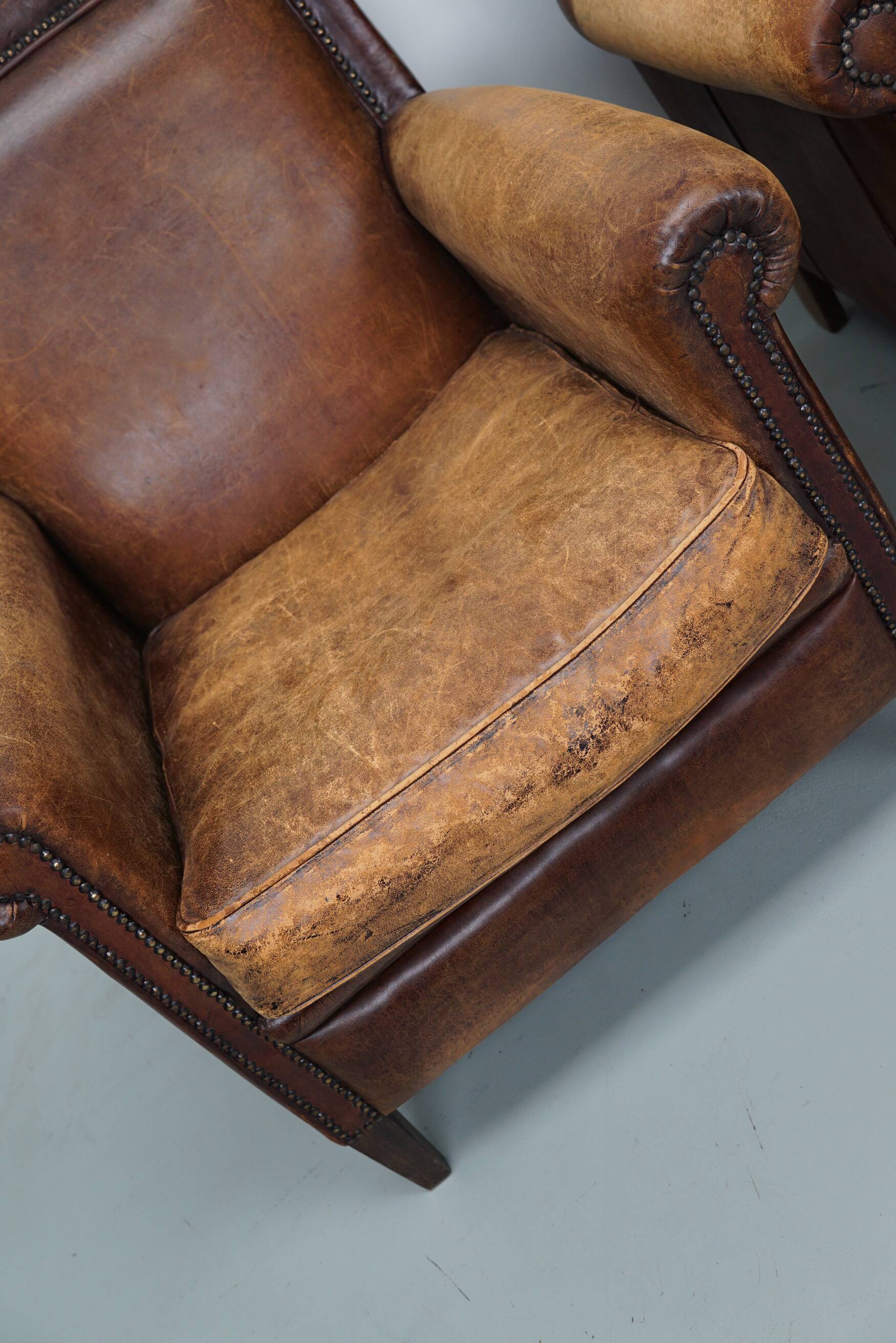 Vintage dutch cognac colored leather club chairs