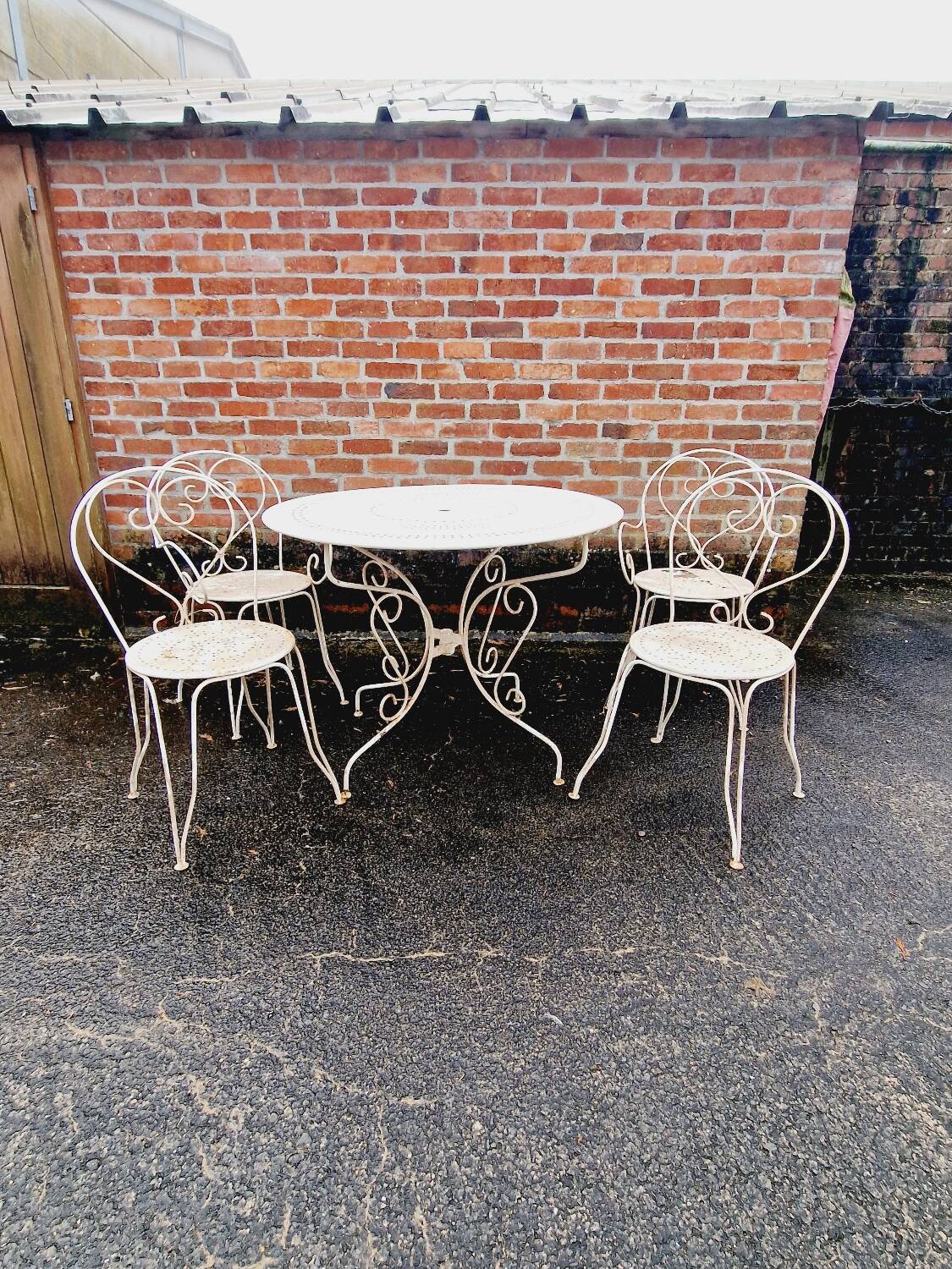 Wrought iron garden furniture chairs and table
