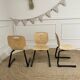 Children's chair resting on table