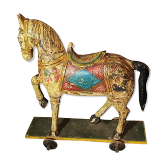 Old horse with wheels