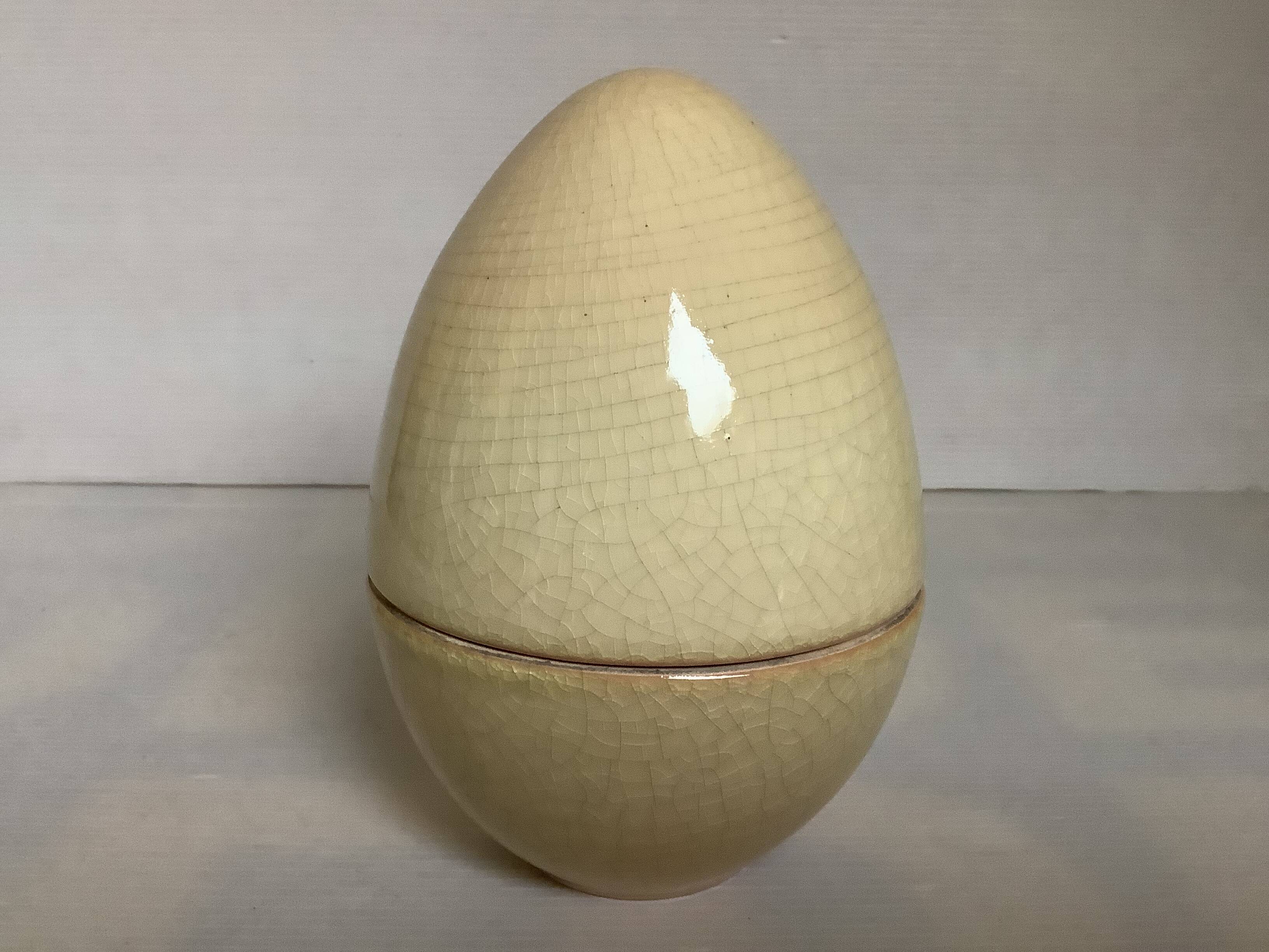 Candy box in the shape of an egg cracked ceramic