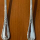 Christofle ribbon and bell-shaped salad serving pieces, very beautiful and