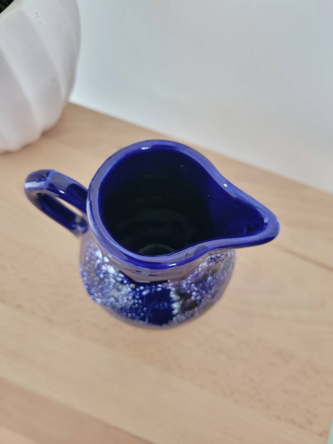 Small enameled ceramic pitcher
