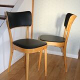 5 baumann chairs with large backs in black faux leather.