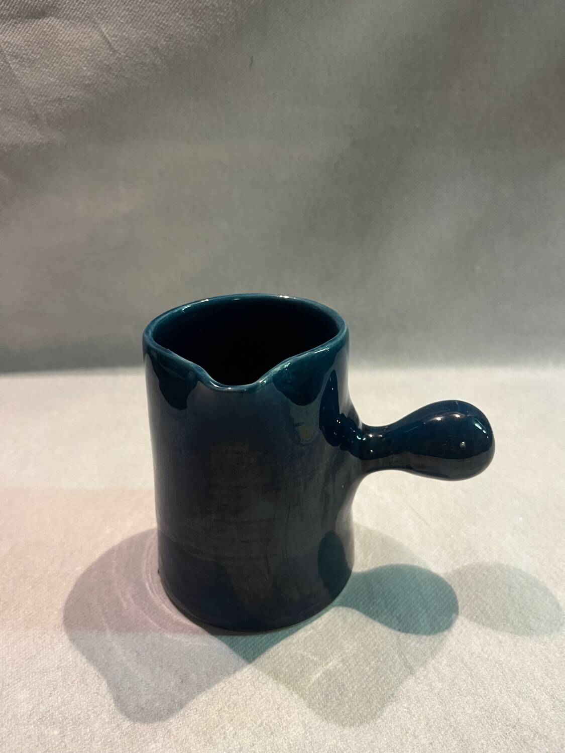 Blue ceramic milk jug