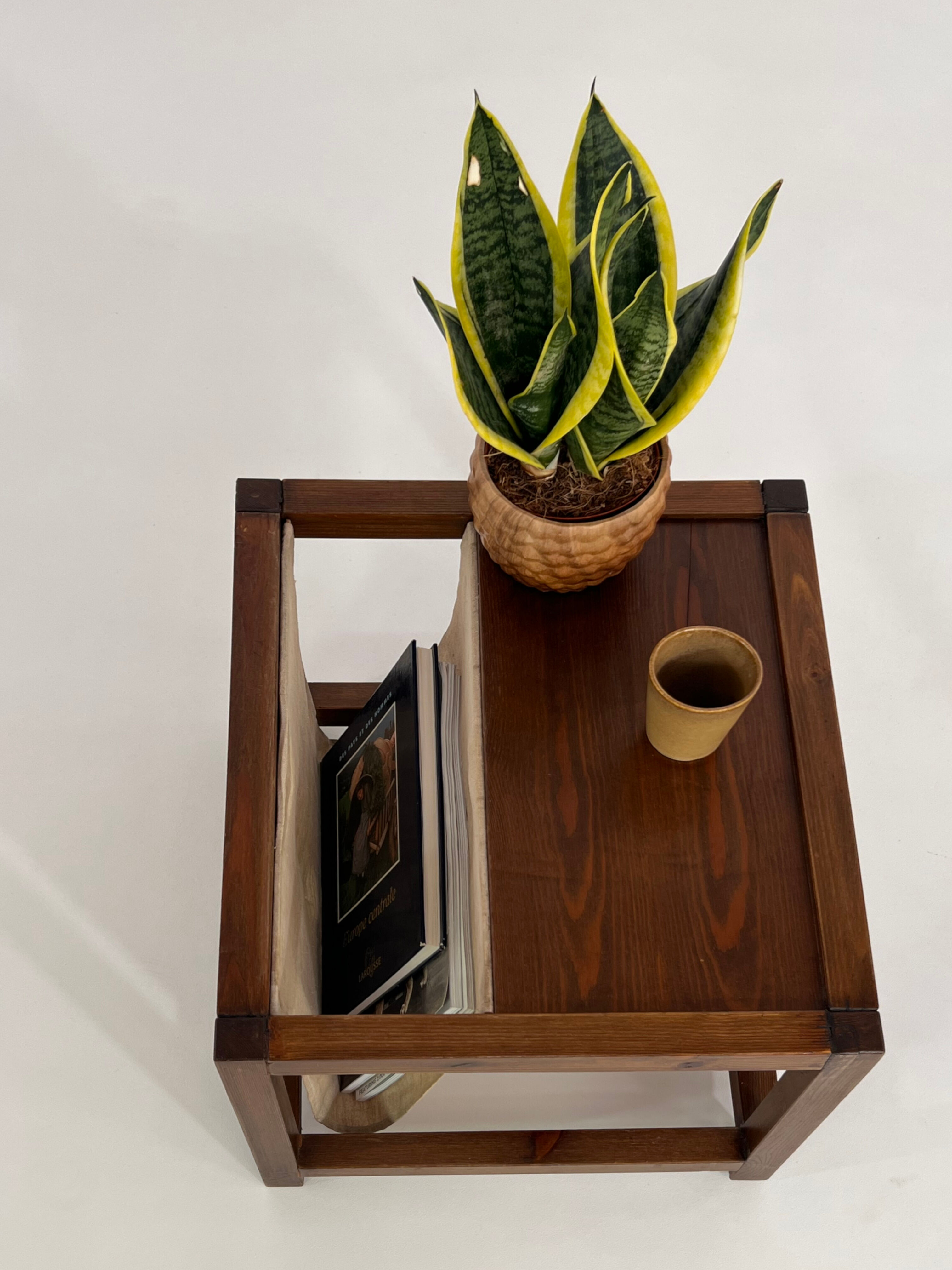 Vintage wooden sofa end with built-in fabric magazine holder