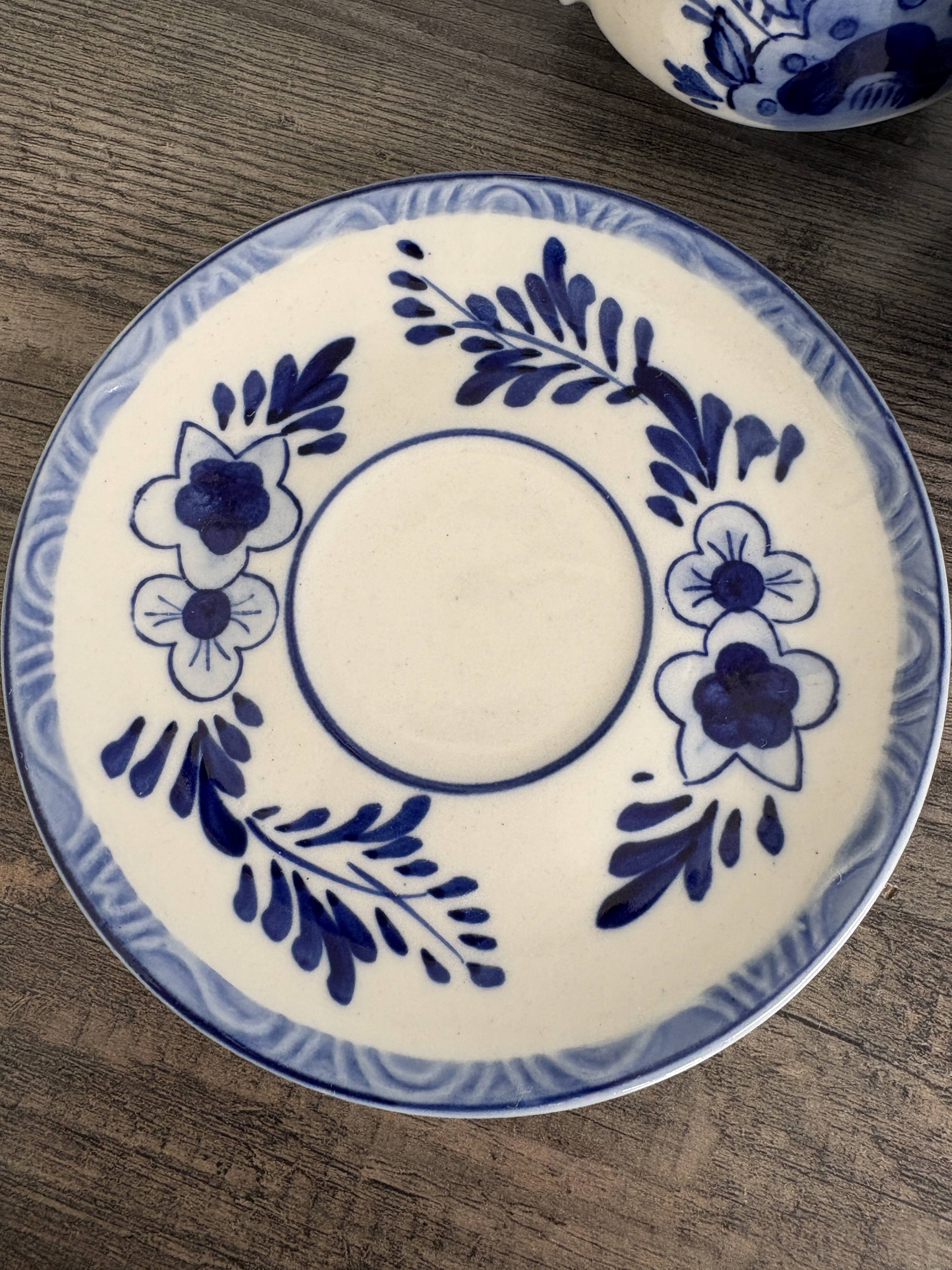 Vintage Dutch Delft Blue earthenware service for 5 cups and saucers.