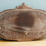 Beveled mirror in carved wood