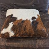Pouf and cow cushion, leather