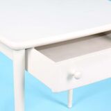 Pair of white lacquered bedside tables