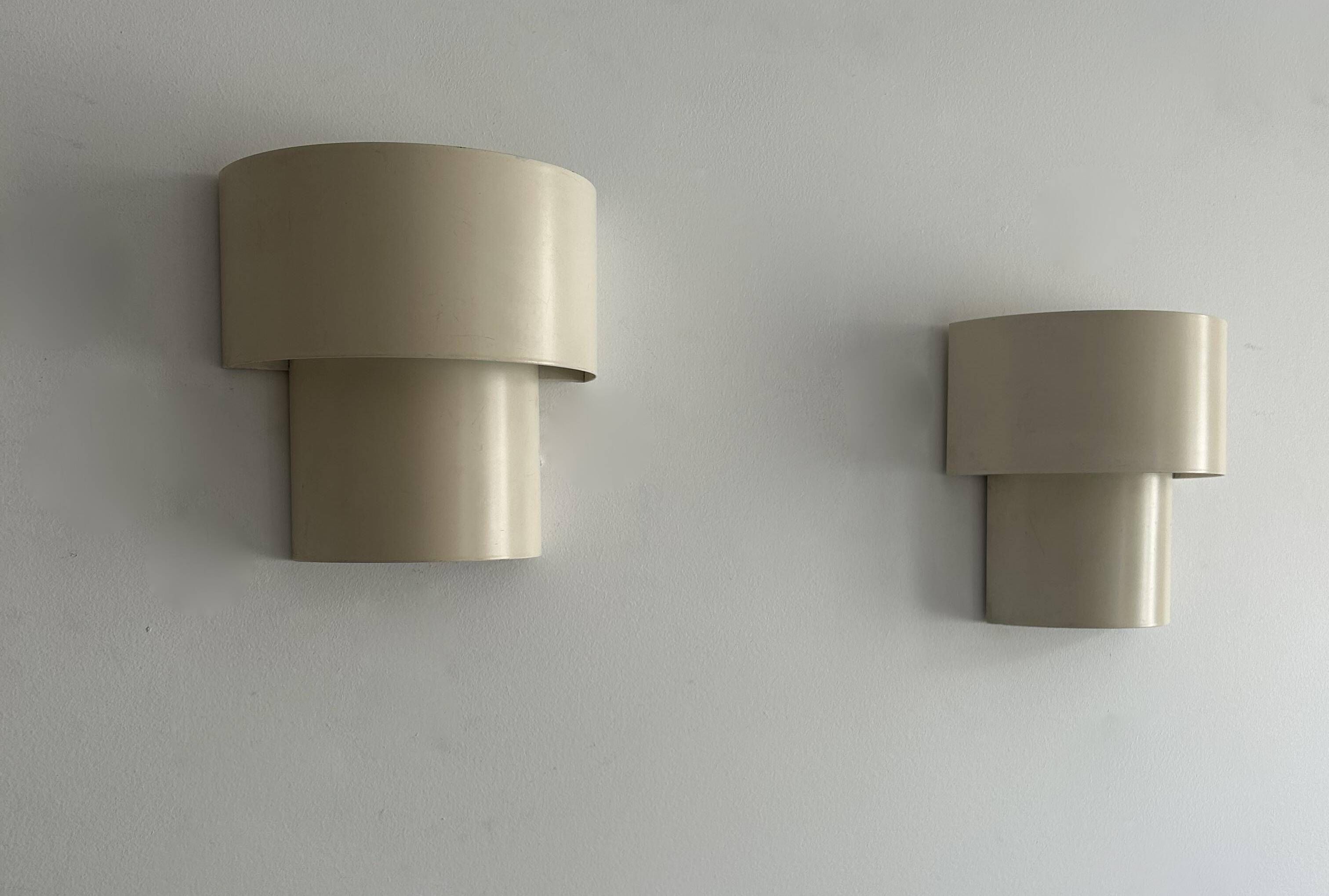 Pair of vintage modernist wall lights, white lacquered metal, Sweden 1970