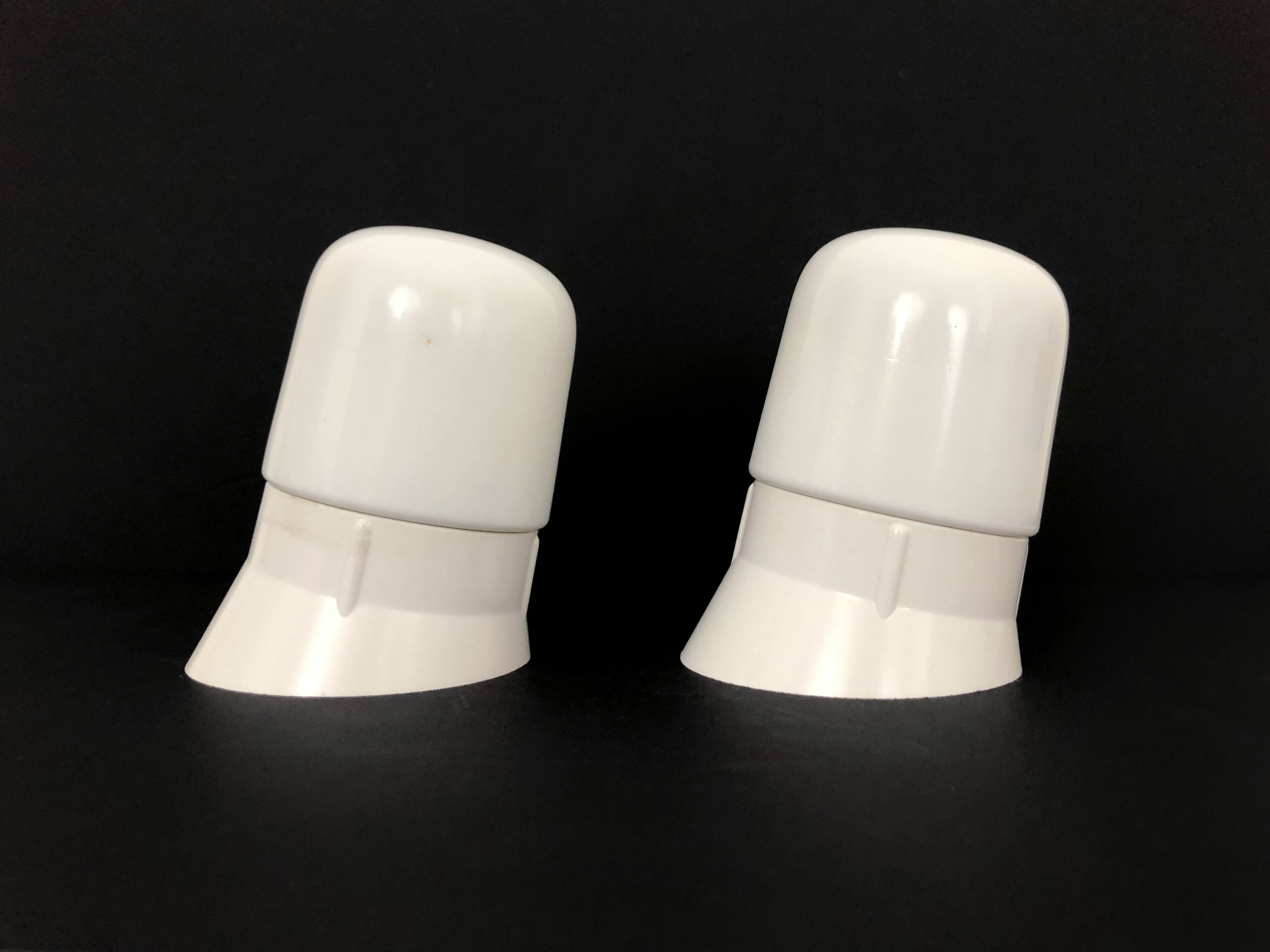 Pair of white oblique wall lights by Arno. 60s