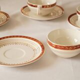 Set of 4 white, red and gold porcelain teacups, Ceranord