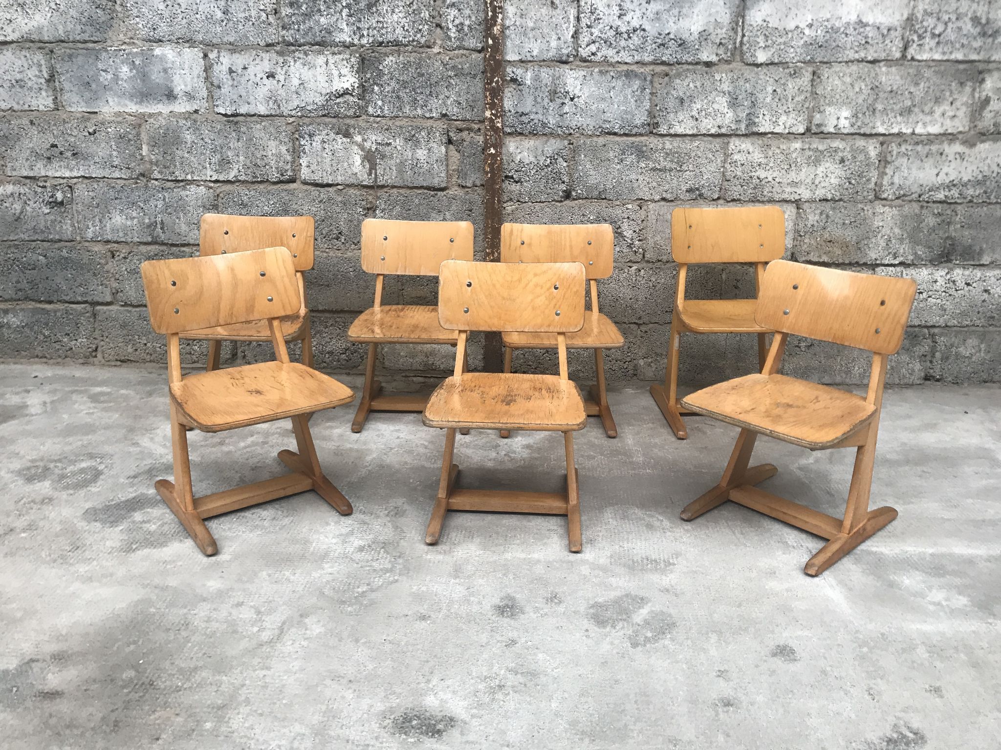 Series of 10 casala children's chairs in vintage light wood