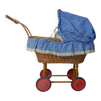 Old rattan stroller pram for vintage doll