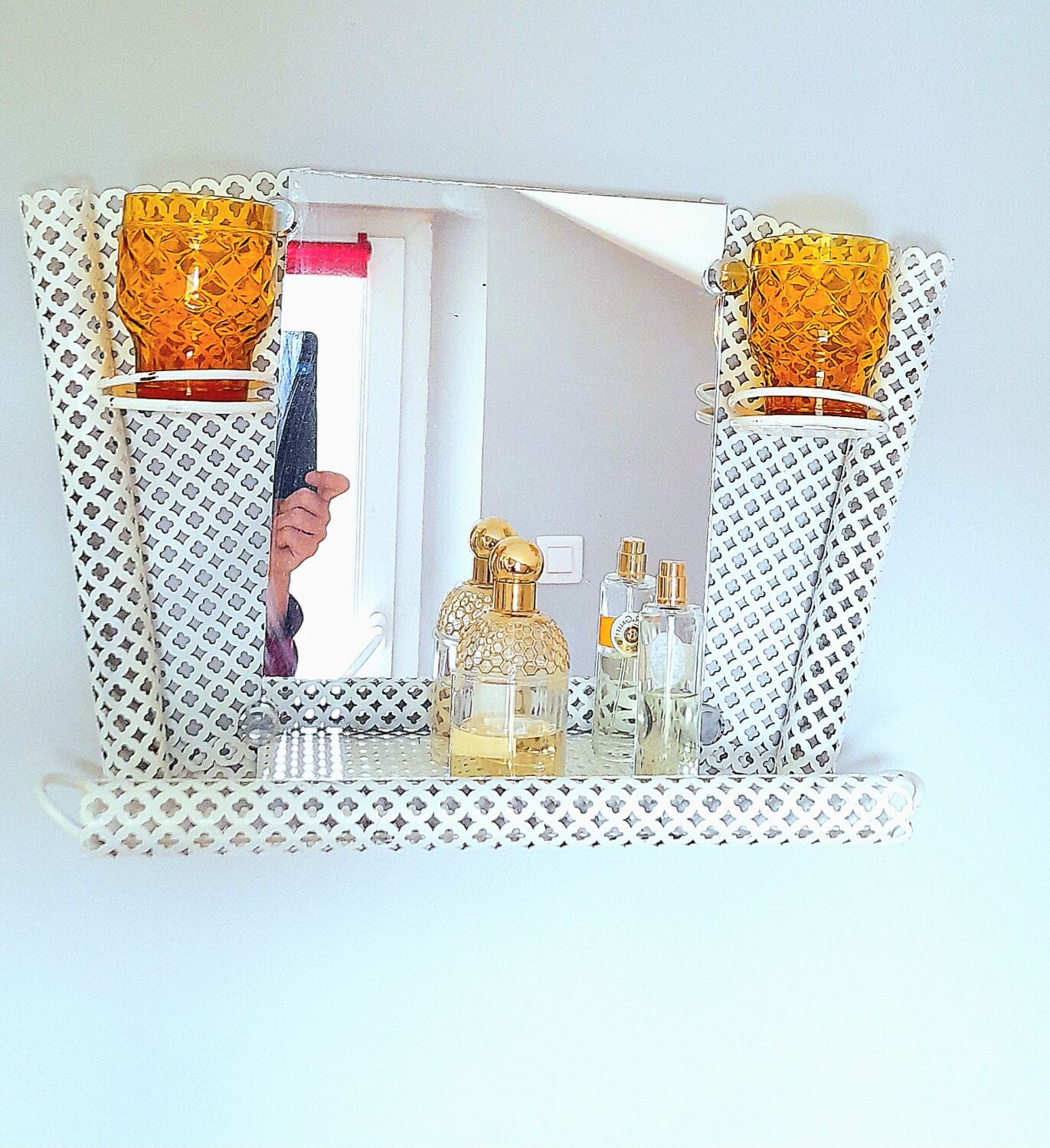 Perforated sheet metal bathroom shelf