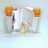 Perforated sheet metal bathroom shelf