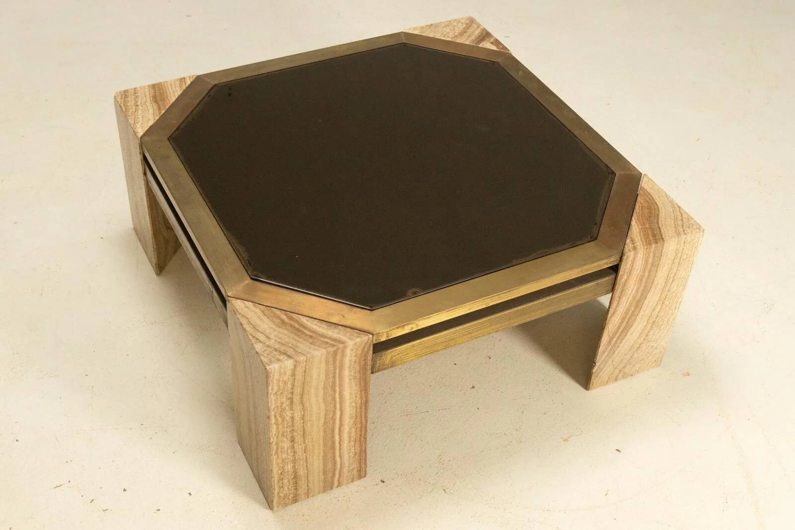 Stone and brass coffee table, 1970s, Italy.