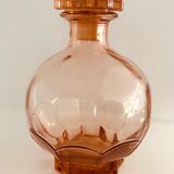 Service with vintage liqueur in pink rosaline glass