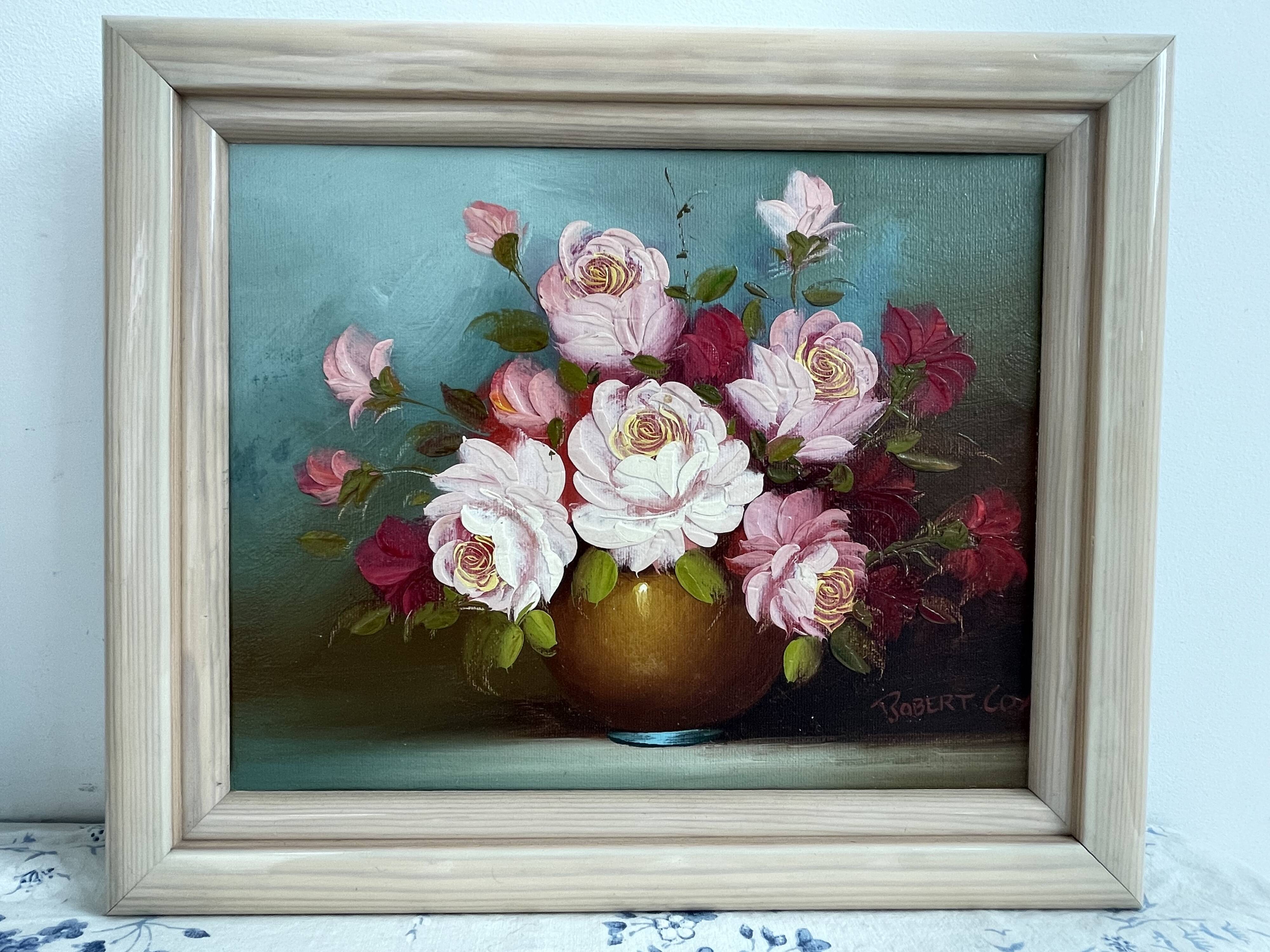 Pair of oils on canvas signed by Robert Cox, floral still lifes.