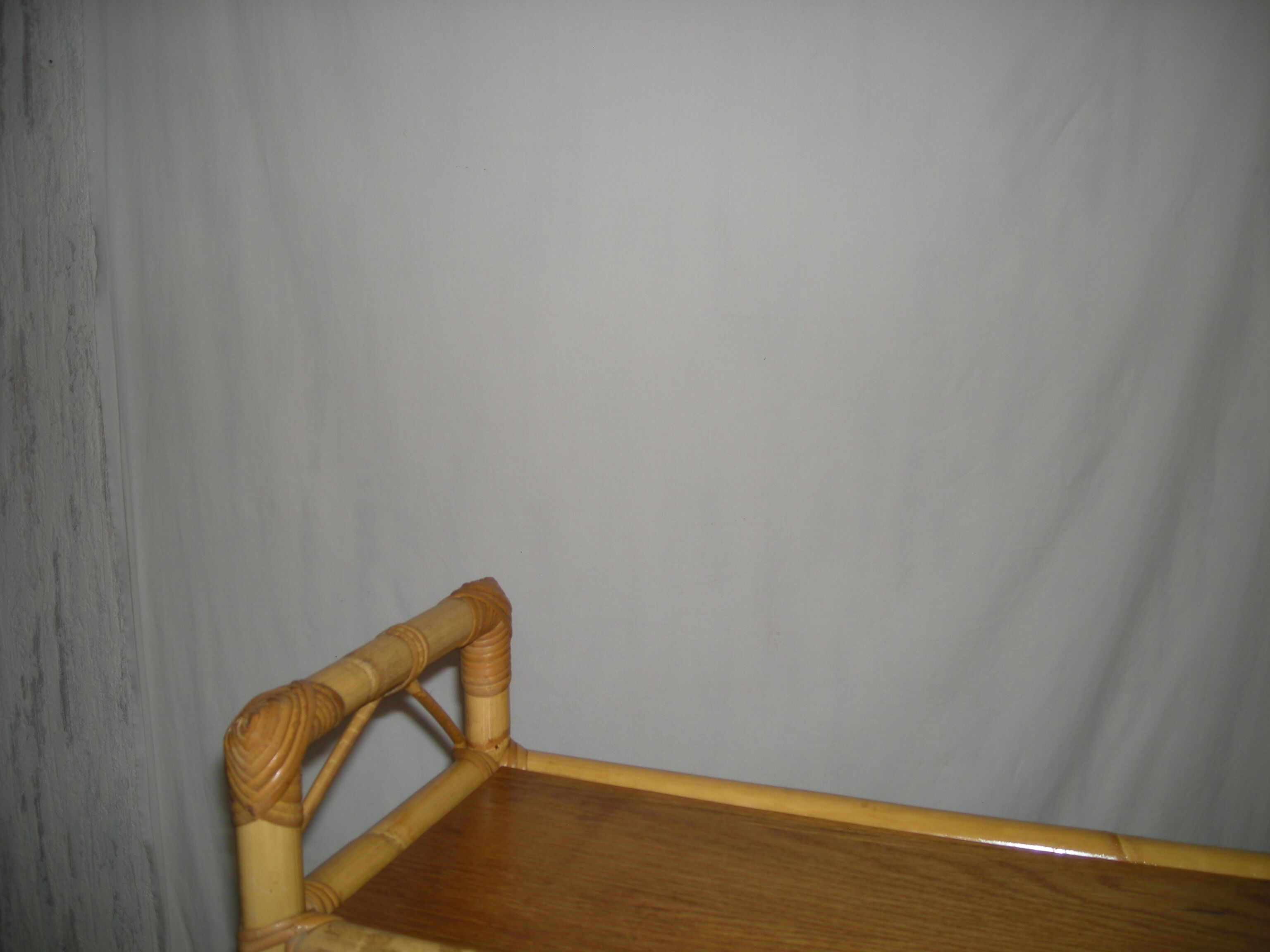 Rattan bamboo shelf on feet from the 50s 60s