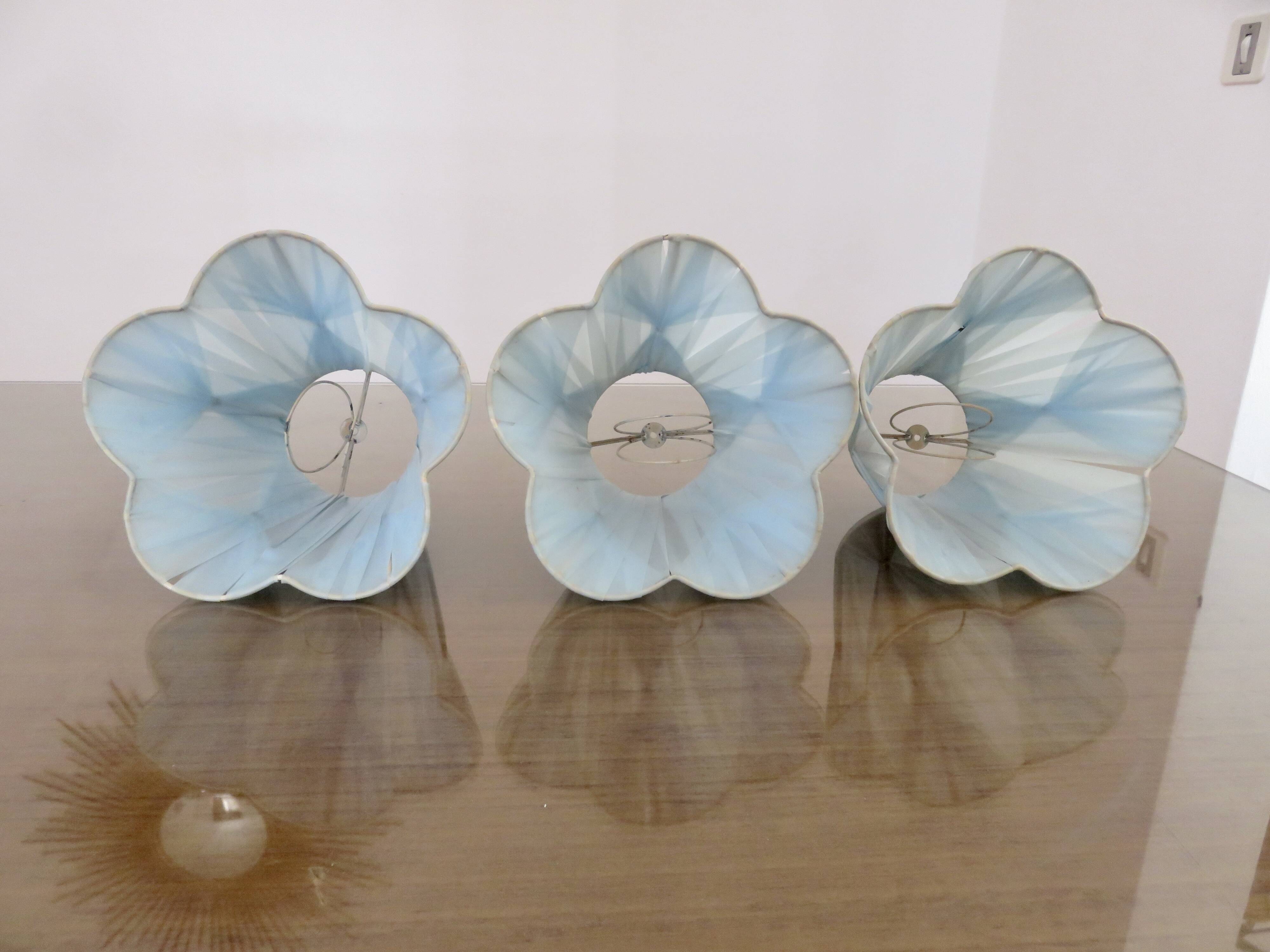 Set of 3 pale blue plastic strip lampshades, to clip onto a bulb.