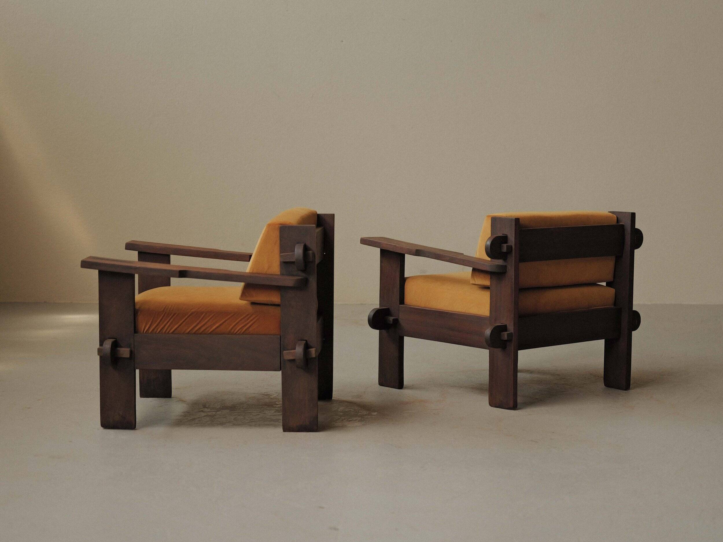 Pair of architect's armchairs in solid wood, France, circa 1970.
