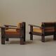 Pair of architect's armchairs in solid wood, France, circa 1970.