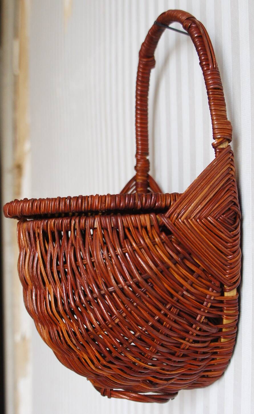 Woven rattan wall basket