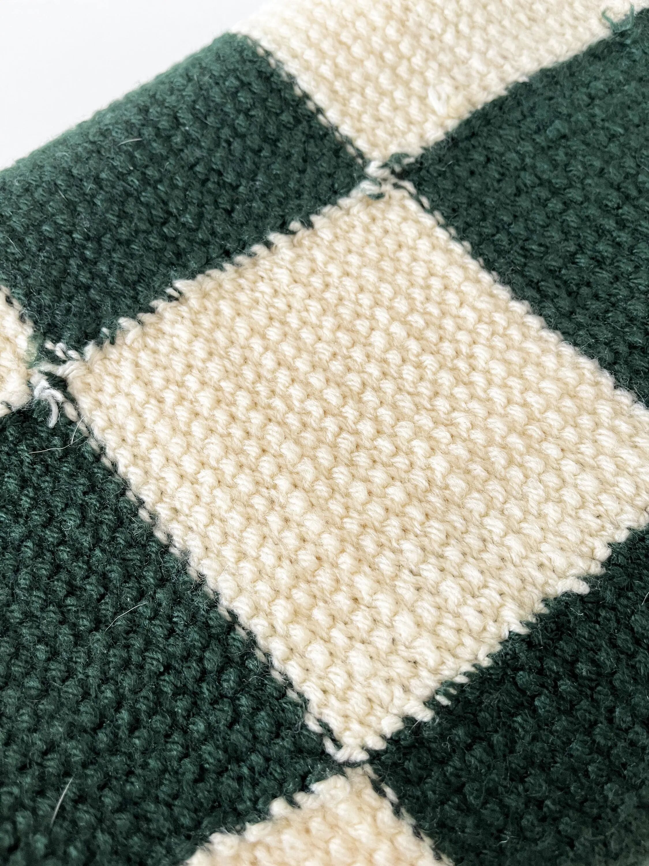 Handmade knitted wool vichy blanket