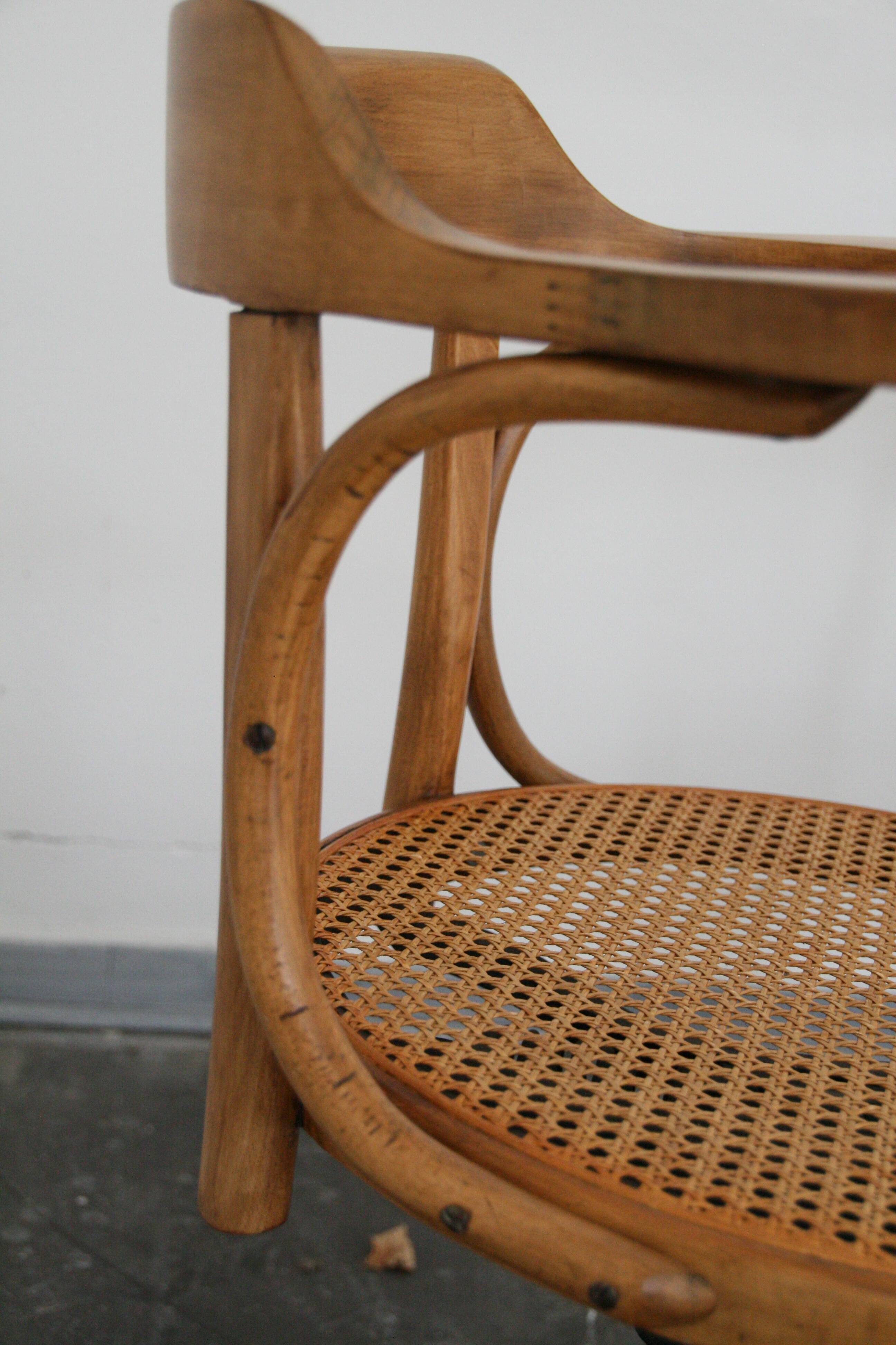 A pair of vintage bent wood svivel chairs by Salvaatore Leone Italy