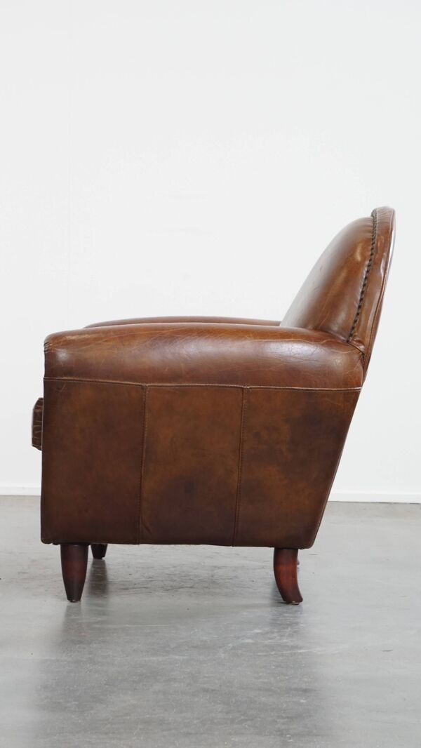 Fauteuil en cuir de vache marron