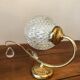 Duo of brass and glass wall lamps