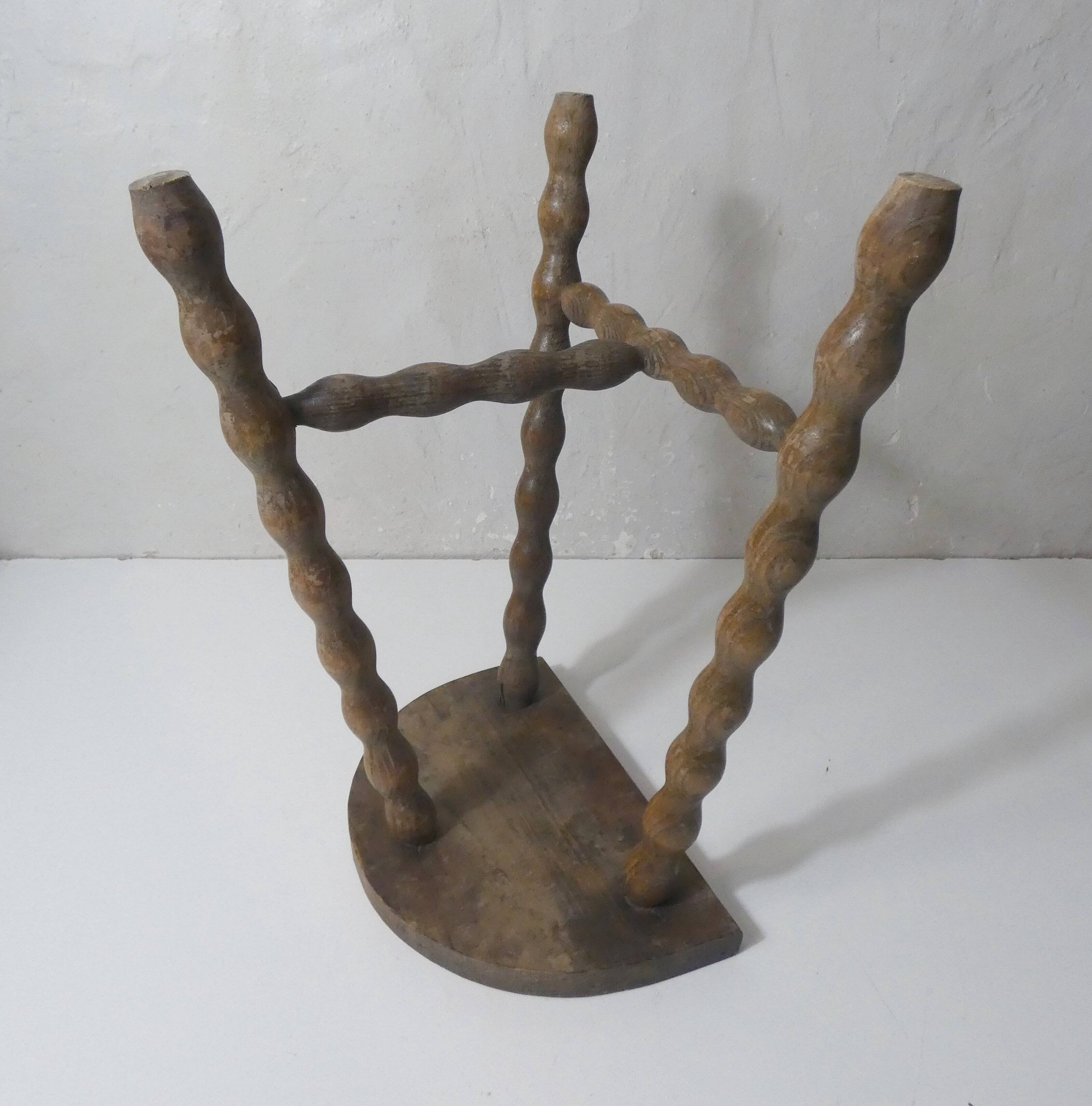 vintage half-moon tripod stool in turned solid wood with beaded edges