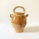 Old ochre and yellow glazed ceramic jug / goat