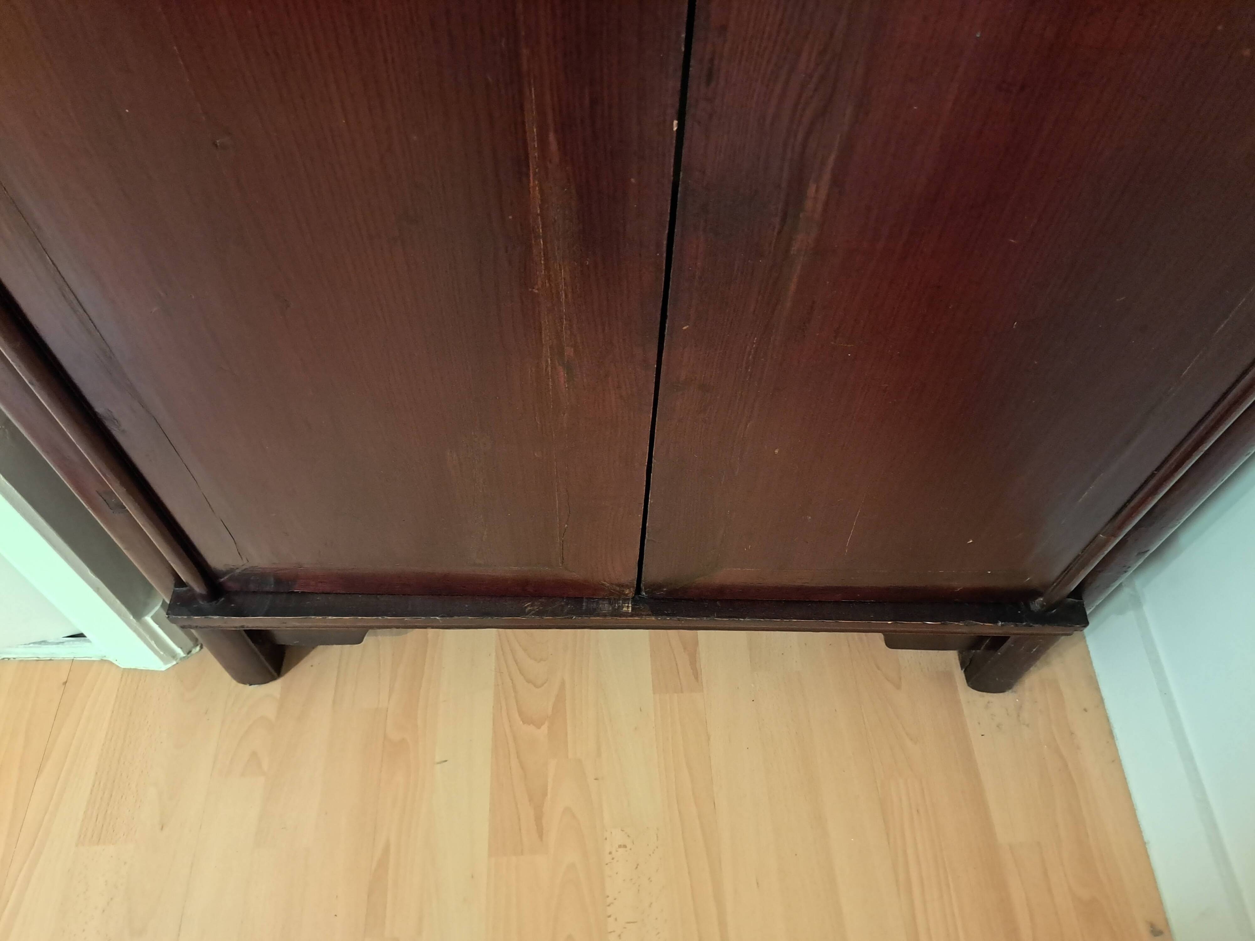 Brown lacquered Chinese wardrobe from Shandong.