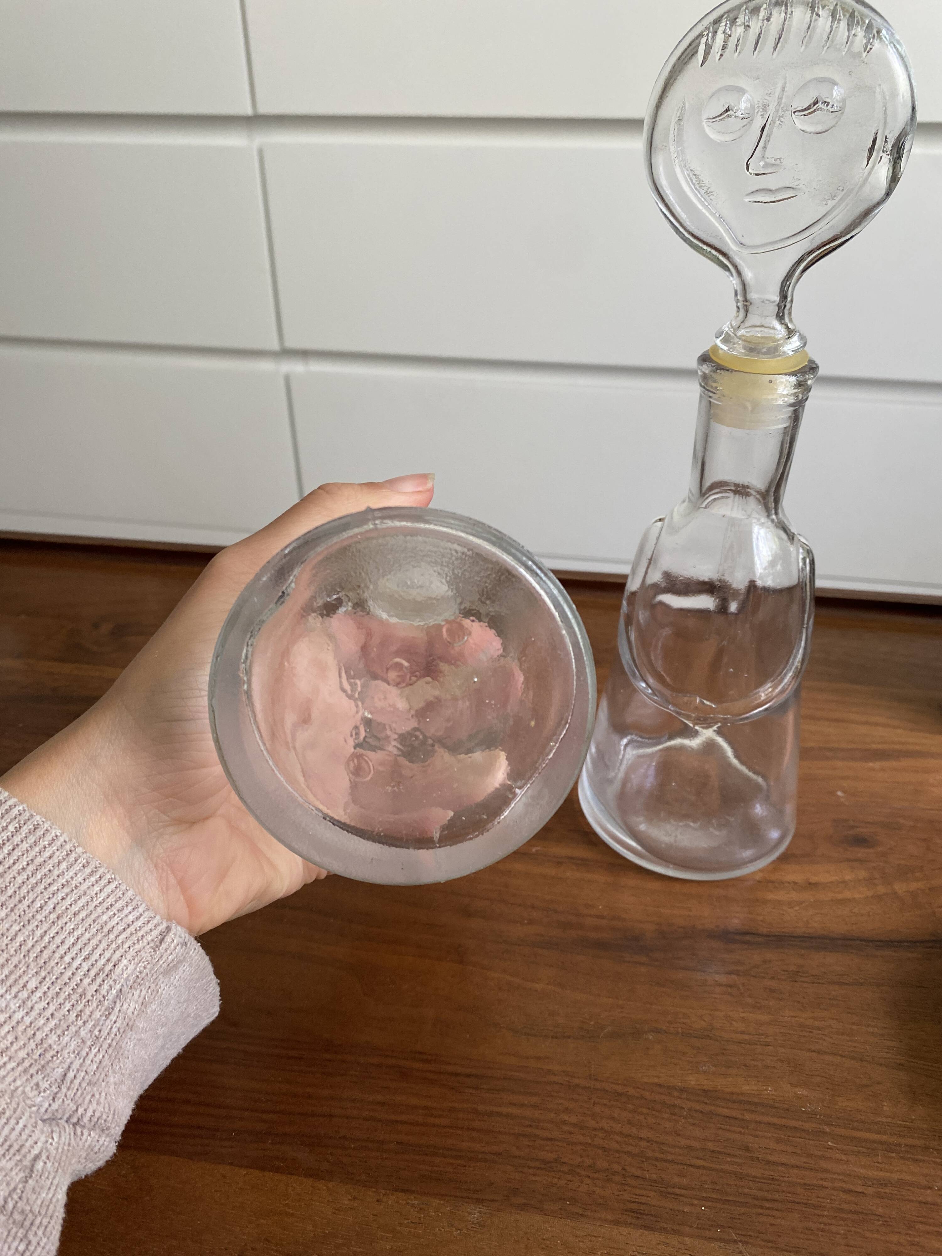 Pair of decanters by Erik Hoglund for Neiman Marcus, "People" series, Kosta Boda