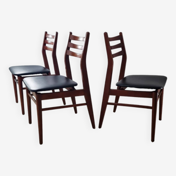 Scandinavian chairs in wood and black skai