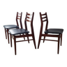 Scandinavian chairs in wood and black skai