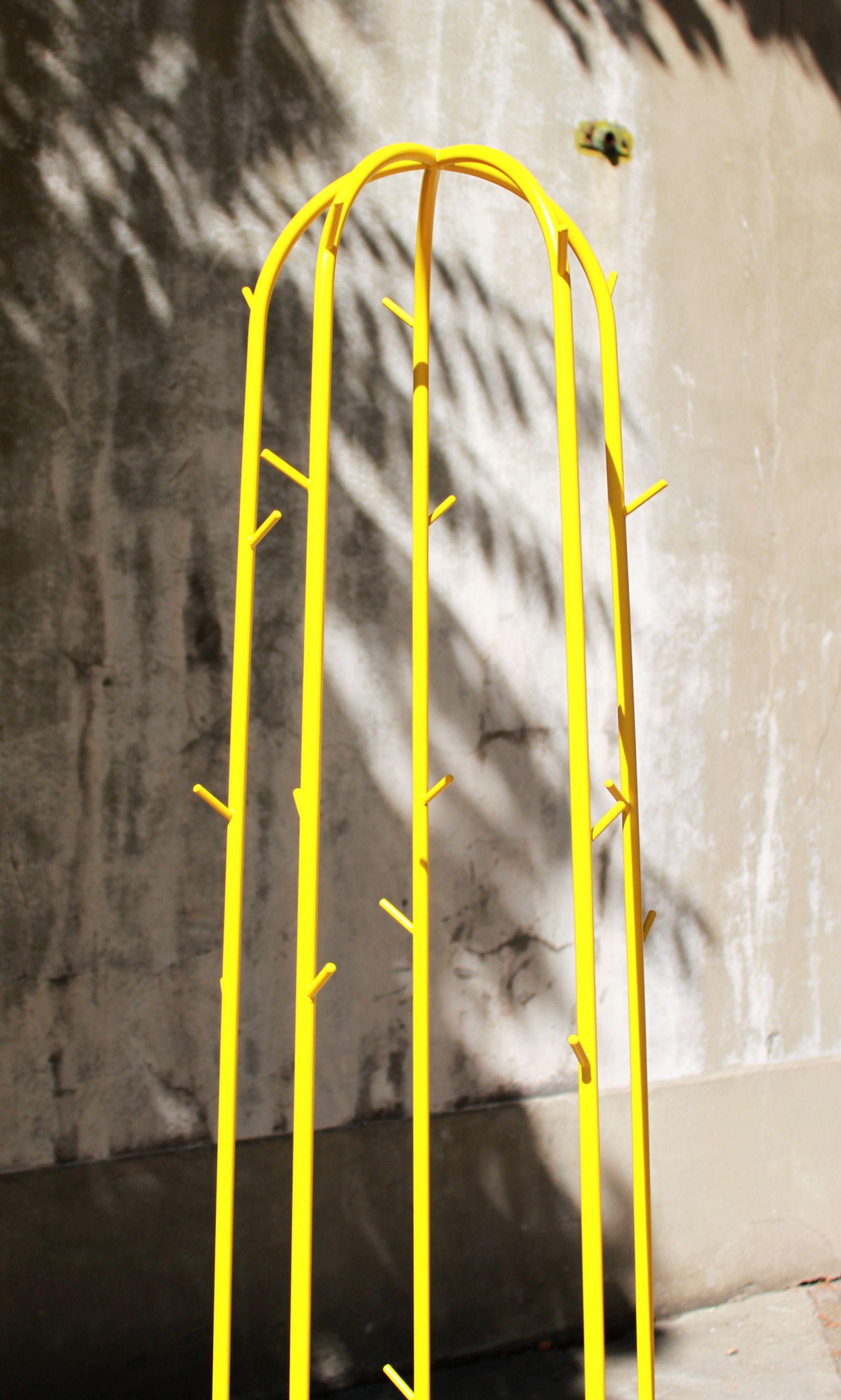 Yellow lase metal coat hanger 90's